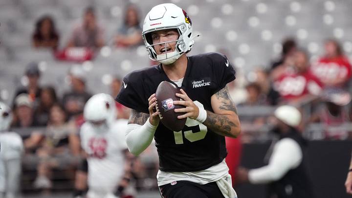 Arizona Cardinals quarterback Carson Beck (19) scrambles out of the pocket during their training camp red and white practice at State Farm Stadium in Glendale on Aug. 9, 2026.