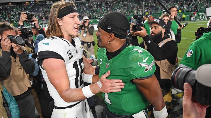 Nov 3, 2024; Philadelphia, Pennsylvania, USA; Jacksonville Jaguars quarterback Trevor Lawrence (16) and Philadelphia Eagles quarterback Jalen Hurts (1) meet on the field after the game at Lincoln Financial Field. Mandatory Credit: Eric Hartline-Imagn Images