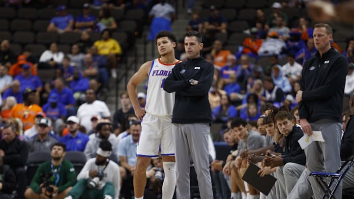 Nov 4, 2024; Jacksonville, Florida, USA; Florida Gators guard Walter Clayton Jr. (1) and head coach Todd Golden during the game against South Florida Bulls during the first half at VyStar Veterans Memorial Arena. Mandatory Credit: Morgan Tencza-Imagn Images