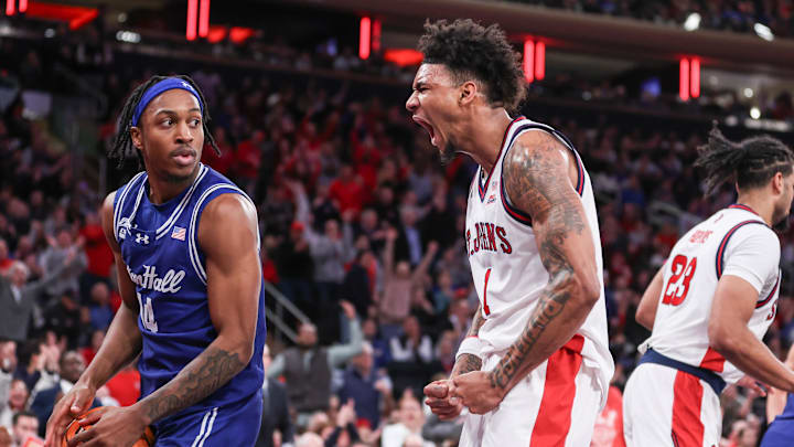 Jan 20, 2026; New York, New York, USA;  St. John's basketball forward Dillon Mitchell (1) celebrates in the direction of Seton Hall Pirates guard A.J. Staton-McCray (14) in the second half at Madison Square Garden.