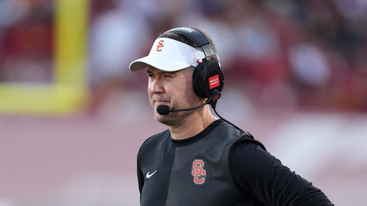 Aug 30, 2025; Los Angeles, California, USA; Southern California Trojans head coach Lincoln Riley watches from the sidelines against the Missouri State Bears in the first half at United Airlines Field at Los Angeles Memorial Coliseum. Mandatory Credit: Kirby Lee-Imagn Images