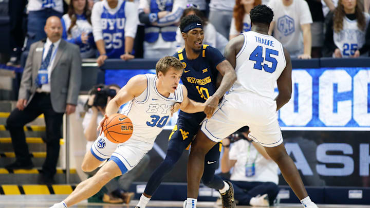 Dallin Hall attacks the screen against West Virginia.