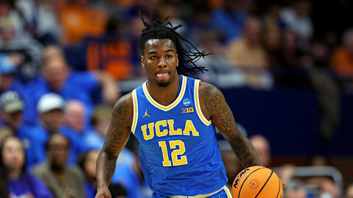 Mar 22, 2025; Lexington, KY, USA; UCLA Bruins guard Sebastian Mack (12) brings the ball up court during the first half against the Tennessee Volunteers in the second round of the NCAA Tournament at Rupp Arena. Mandatory Credit: Jordan Prather-Imagn Images Mar 22, 2025; Lexington, KY, USA; UCLA Bruins guard Sebastian Mack (12) brings the ball up court during the first half against the Tennessee Volunteers in the second round of the NCAA Tournament at Rupp Arena. Mandatory Credit: Jordan Prather-Imagn Images