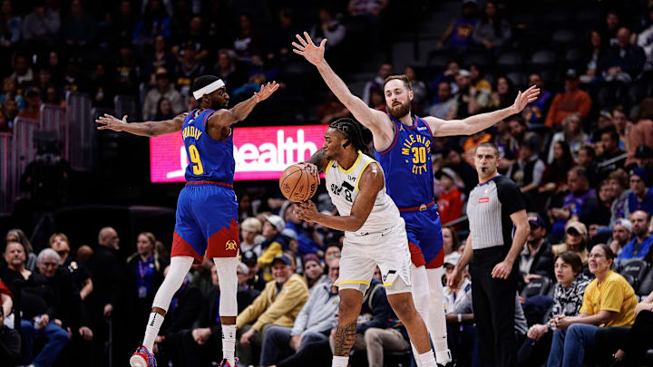 Mar 9, 2024; Denver, Colorado, USA; Utah Jazz forward Brice Sensabaugh (8) passes the ball under