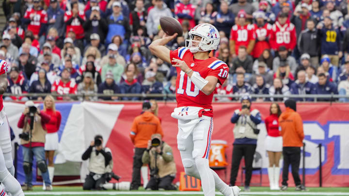 Oct 13, 2024; Foxborough, Massachusetts, USA; New England Patriots quarterback Drake Maye (10) throws the ball against the Houston Texans during the first half at Gillette Stadium. Mandatory Credit: Gregory Fisher-Imagn Images