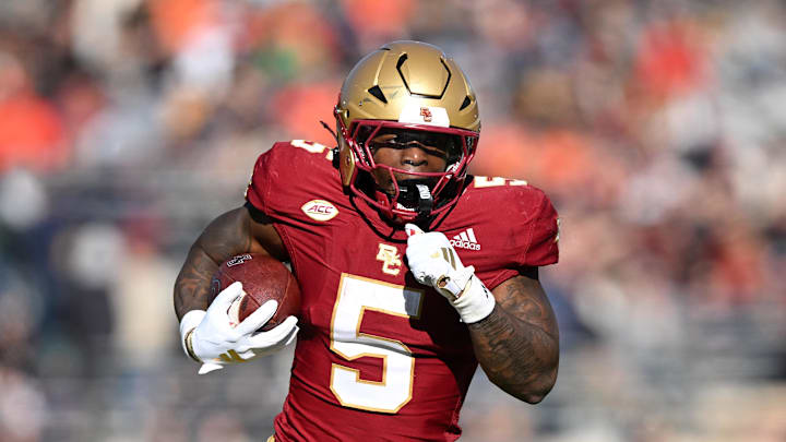 Nov 9, 2024; Chestnut Hill, Massachusetts, USA; Boston College Eagles running back Kye Robichaux (5) runs for a touchdown against the Syracuse Orange during the first half at Alumni Stadium. Mandatory Credit: Brian Fluharty-Imagn Images
