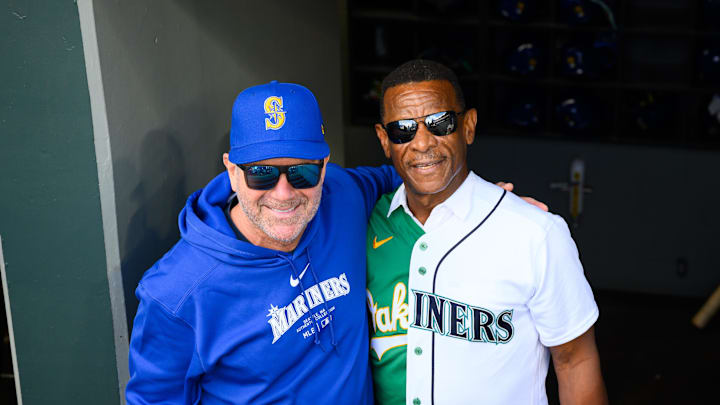 Seattle Mariners hitting coach Edgar Martinez (11) and MLB Hall of Famer Rickey Henderson pose for a photo before the game between the Seattle Mariners and the Oakland Athletics at T-Mobile Park in 2024.