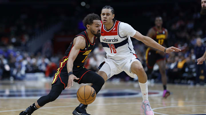 Oct 30, 2024; Washington, District of Columbia, USA; Atlanta Hawks guard Trae Young (11) drives to the basket as Washington Wizards forward Kyshawn George (18) defends in the first half at Capital One Arena. Mandatory Credit: Geoff Burke-Imagn Images Oct 30, 2024; Washington, District of Columbia, USA; Atlanta Hawks guard Trae Young (11) drives to the basket as Washington Wizards forward Kyshawn George (18) defends in the first half at Capital One Arena. Mandatory Credit: Geoff Burke-Imagn Images