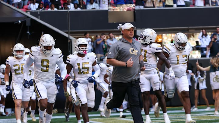 Oct 19, 2024; Atlanta, Georgia, USA; Georgia Tech Yellow Jackets head coach Brent Key runs on the field before a game against the Notre Dame Fighting Irish at Mercedes-Benz Stadium. Mandatory Credit: Brett Davis-Imagn Images