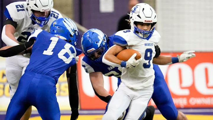 Gladbrook-Reinbeck Treyvon Herron (9) carries the ball against Remsen St. Mary's during the Iowa high school 8-player championship Thursday, Nov. 21, 2024 at the UNI-Dome in Cedar Falls, Iowa.