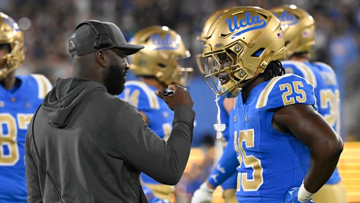 Sep 28, 2024; Pasadena, California, USA; UCLA Bruins head coach DeShaun Foster talks to Oregon Ducks at the Rose Bowl. Mandatory Credit: Robert Hanashiro-Imagn Images