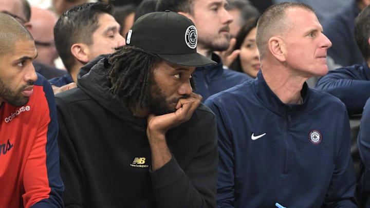 Los Angeles Clippers forward Kawhi Leonard (2) looks on from the bench in the first half against the Orlando Magic at Intuit Dome. Mandatory Credit: Jayne Kamin-Oncea-Imagn Images