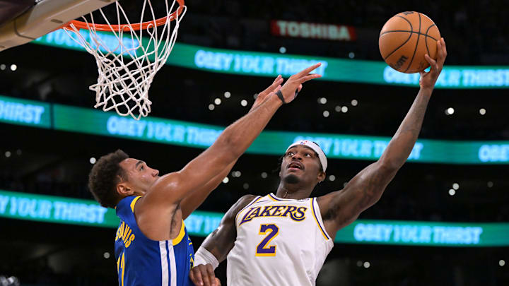 Oct 12, 2025; Los Angeles, California, USA; Golden State Warriors forward Trayce Jackson-Davis (32) blocks a shot by Los Angeles Lakers forward Jarred Vanderbilt (2) during the first half at Crypto.com Arena. Mandatory Credit: Jayne Kamin-Oncea-Imagn Images Oct 12, 2025; Los Angeles, California, USA; Golden State Warriors forward Trayce Jackson-Davis (32) blocks a shot by Los Angeles Lakers forward Jarred Vanderbilt (2) during the first half at Crypto.com Arena. Mandatory Credit: Jayne Kamin-Oncea-Imagn Images