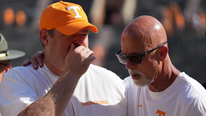 Tennessee football coach Josh Heupel talks with secondary coach Willie Martinez after the win over UAB in an NCAA college football game on September 20, 2025, in Knoxville, Tennessee. Tennessee football coach Josh Heupel talks with secondary coach Willie Martinez after the win over UAB in an NCAA college football game on September 20, 2025, in Knoxville, Tennessee.