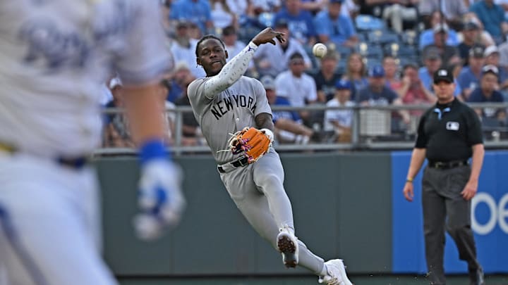 Jun 10, 2025; Kansas City, Missouri, USA;  New York Yankees third baseman Jazz Chisholm Jr. (13) throws the ball to first base in the second inning against the Kansas City Royals at Kauffman Stadium. Mandatory Credit: Peter Aiken-Imagn Images