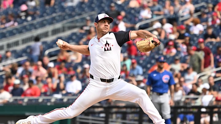 Washington Nationals relief pitcher Jacob Barnes (59) throws a pitch against the Chicago Cubs during the seventh inning at Nationals Park in 2024.