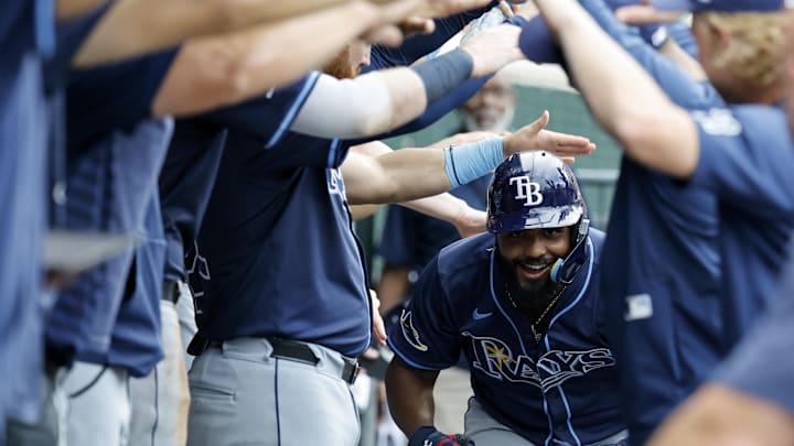 Jul 9, 2025; Detroit, Michigan, USA;  Tampa Bay Rays third baseman Junior Caminero (13) receives congratulations from teammates after he hits a home run in the seventh inning against the Detroit Tigers at Comerica Park. Mandatory Credit: Rick Osentoski-Imagn Images