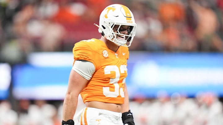Tennessee linebacker Ben Bolton (33) smiles on the field during the Aflac Kickoff Game between the Volunteers and Syracuse held at Mercedes-Benz Stadium in Atlanta, Ga., on August 30, 2025. Tennessee linebacker Ben Bolton (33) smiles on the field during the Aflac Kickoff Game between the Volunteers and Syracuse held at Mercedes-Benz Stadium in Atlanta, Ga., on August 30, 2025.