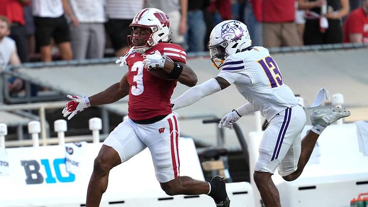 Wisconsin Badgers running back Abu Sama III (3) breaks away from Western Illinois Leathernecks defensive back Tysean Griffin (13) for a 72-yard touchdown run in the first quarter during their football game Saturday, Sept. 12, 2026, at Camp Randall Stadium in Madison, Wisconsin.