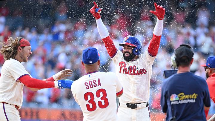 Aug 9, 2026; Philadelphia, Pennsylvania, USA; Philadelphia Phillies center fielder Derek Hill (49) celebrates his walk-off RBI single during the twelfth inning against the Toronto Blue Jays at Citizens Bank Park. Mandatory Credit: Eric Hartline-Imagn Images Aug 9, 2026; Philadelphia, Pennsylvania, USA; Philadelphia Phillies center fielder Derek Hill (49) celebrates his walk-off RBI single during the twelfth inning against the Toronto Blue Jays at Citizens Bank Park. Mandatory Credit: Eric Hartline-Imagn Images