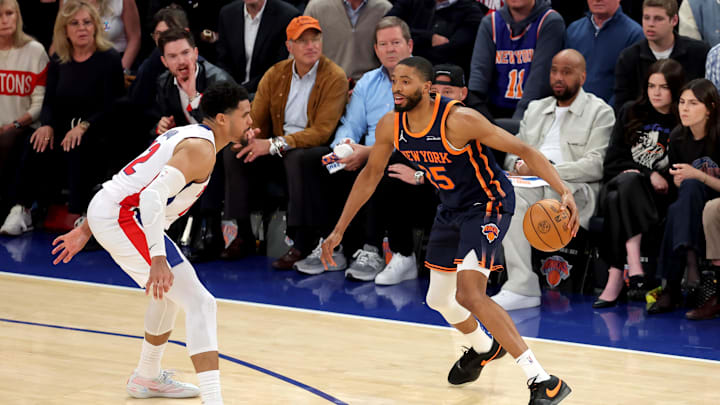 New York Knicks forward Mikal Bridges controls the ball against Detroit Pistons forward Tobias Harris. Mandatory Credit: Brad Penner-Imagn Images New York Knicks forward Mikal Bridges controls the ball against Detroit Pistons forward Tobias Harris. Mandatory Credit: Brad Penner-Imagn Images