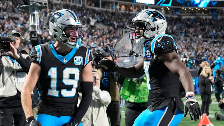 Dec 1, 2024; Charlotte, North Carolina, USA; Carolina Panthers wide receiver Adam Thielen (19) celebrates with wide receiver Xavier Legette (17) after scoring. a touchdown to take the lead with 30 seconds left in the fourth quarter at Bank of America Stadium. Mandatory Credit: Bob Donnan-Imagn Images