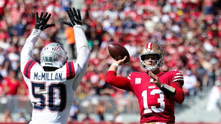 Sep 29, 2024; Santa Clara, California, USA; San Francisco 49ers quarterback Brock Purdy (13) looks to pass the ball against New England Patriots linebacker Raekwon McMillan (50) during the second quarter at Levi's Stadium. Mandatory Credit: Sergio Estrada-Imagn Images Sep 29, 2024; Santa Clara, California, USA; San Francisco 49ers quarterback Brock Purdy (13) looks to pass the ball against New England Patriots linebacker Raekwon McMillan (50) during the second quarter at Levi's Stadium. Mandatory Credit: Sergio Estrada-Imagn Images