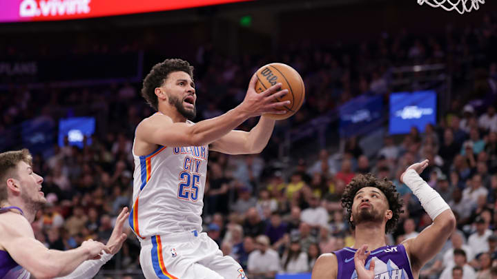 Apr 11, 2025; Salt Lake City, Utah, USA; Oklahoma City Thunder guard Ajay Mitchell (25) puts the ball up to the basket during the second quarter against the Utah Jazz at Delta Center. Mandatory Credit: Chris Nicoll-Imagn Images Apr 11, 2025; Salt Lake City, Utah, USA; Oklahoma City Thunder guard Ajay Mitchell (25) puts the ball up to the basket during the second quarter against the Utah Jazz at Delta Center. Mandatory Credit: Chris Nicoll-Imagn Images