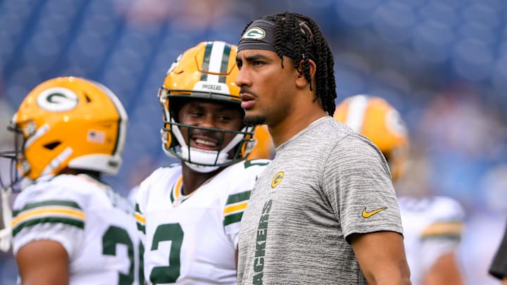 Sep 22, 2024; Nashville, Tennessee, USA;  Green Bay Packers quarterback Jordan Love (10) and Green Bay Packers quarterback Malik Willis (2) look on during pregame warmups before the game against the Tennessee Titans at Nissan Stadium. Mandatory Credit: Steve Roberts-Imagn Images