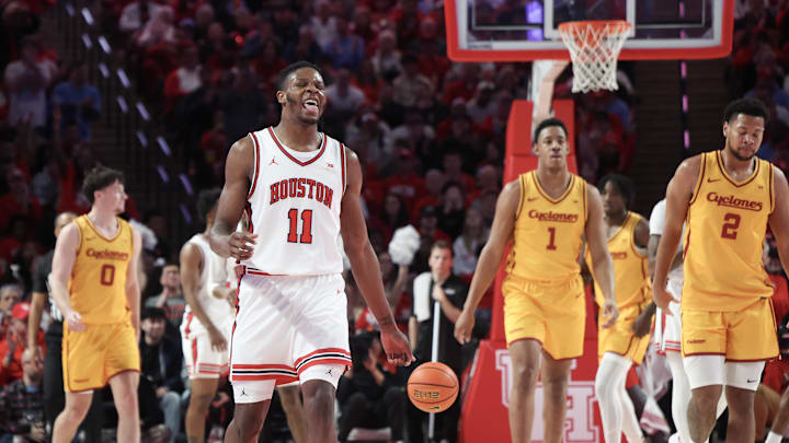 Feb 22, 2025; Houston, Texas, USA; Houston Cougars forward Joseph Tugler (11) reacts after Iowa State Cyclones turned the ball over  in the first half at Fertitta Center. Mandatory Credit: Thomas Shea-Imagn Images