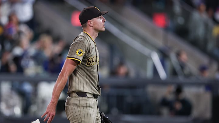 Sep 17, 2025; New York City, New York, USA; San Diego Padres starting pitcher Nick Pivetta (27) reacts after allowing a solo home run to New York Mets designated hitter Starling Marte (not pictured) during the fourth inning at Citi Field. Mandatory Credit: Vincent Carchietta-Imagn Images