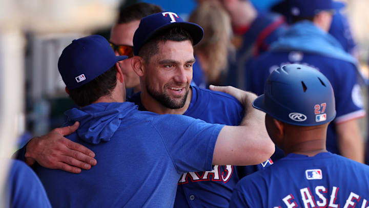 Sep 29, 2024; Anaheim, California, USA; Texas Rangers starting pitcher Nathan Eovaldi (17) hugs a teammate after pitching in the seventh inning against the Los Angeles Angels at Angel Stadium. Sep 29, 2024; Anaheim, California, USA; Texas Rangers starting pitcher Nathan Eovaldi (17) hugs a teammate after pitching in the seventh inning against the Los Angeles Angels at Angel Stadium.