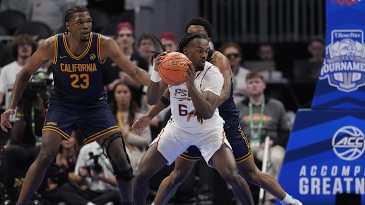 Mar 11, 2026; Charlotte, NC, USA; Florida State Seminoles guard Robert McCray V. (6) handles the ball against the California Golden Bears during the second half  at Spectrum Center. Mandatory Credit: Jim Dedmon-Imagn Images