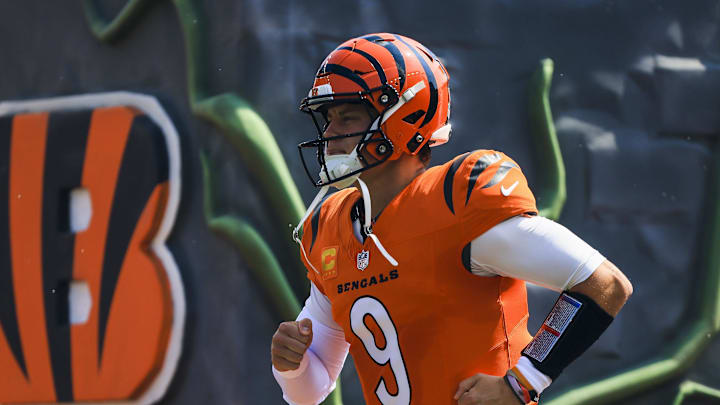 Sep 14, 2025; Cincinnati, Ohio, USA; Cincinnati Bengals quarterback Joe Burrow (9) runs onto the field before the game against the Jacksonville Jaguars at Paycor Stadium. Mandatory Credit: Katie Stratman-Imagn Images