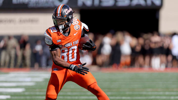 Oklahoma State's Brennan Presley (80) runs after a reception in the first half of the college football between the Oklahoma State University Cowboys and the Utah Utes at Boone Pickens Stadium in Stillwater, Okla., Saturday, Sept., 21, 2024. Oklahoma State's Brennan Presley (80) runs after a reception in the first half of the college football between the Oklahoma State University Cowboys and the Utah Utes at Boone Pickens Stadium in Stillwater, Okla., Saturday, Sept., 21, 2024.