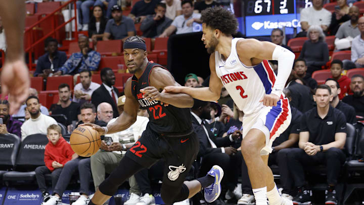Mar 5, 2024; Miami, Florida, USA; Detroit Pistons guard Cade Cunningham (2) defends Miami Heat forward Jimmy Butler (22) during the second half at Kaseya Center. Mandatory Credit: Rhona Wise-USA TODAY Sports