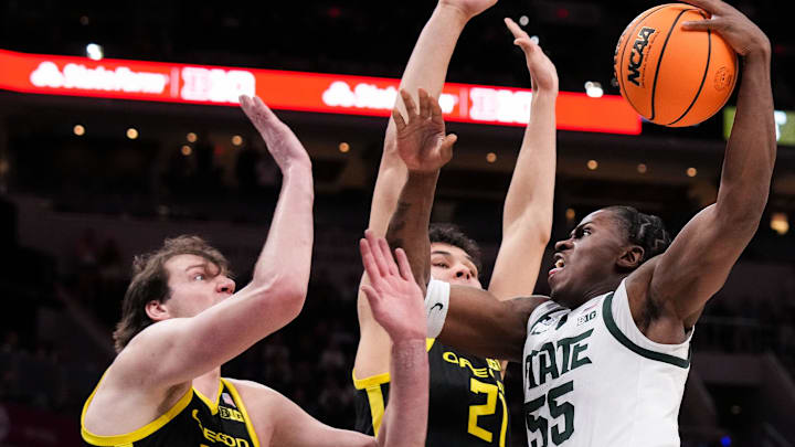 Michigan State Spartans forward Coen Carr takes it to the hoop against Nate Bittle at the Big Ten Tournament last Friday.  