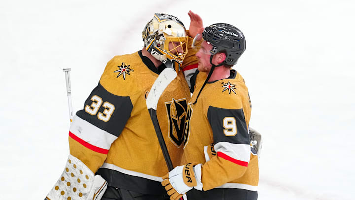Feb 22, 2025; Las Vegas, Nevada, USA; Vegas Golden Knights center Jack Eichel (9) congratulates Vegas Golden Knights goaltender Adin Hill (33) after the Golden Knights defeated the Vancouver Canucks at T-Mobile Arena. Mandatory Credit: Stephen R. Sylvanie-Imagn Images
