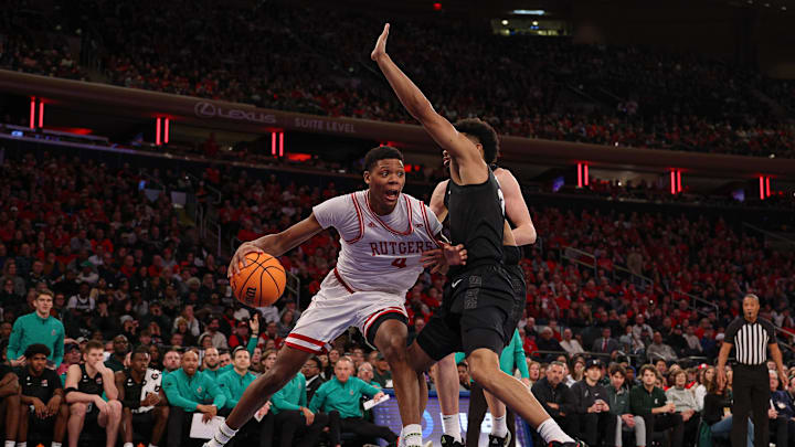 Jan 25, 2025; New York, New York, USA; Rutgers Scarlet Knights guard Ace Bailey (4) is guarded by Michigan State Spartans guard Jaden Akins (3) during the first half at Madison Square Garden. Mandatory Credit: Vincent Carchietta-Imagn Images Jan 25, 2025; New York, New York, USA; Rutgers Scarlet Knights guard Ace Bailey (4) is guarded by Michigan State Spartans guard Jaden Akins (3) during the first half at Madison Square Garden. Mandatory Credit: Vincent Carchietta-Imagn Images
