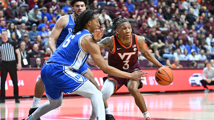 Jan 31, 2026; Blacksburg, Va.; Virginia Tech guard Ben Hammond (3) drives toward the basket, defended by Duke forward Maliq Brown (6).