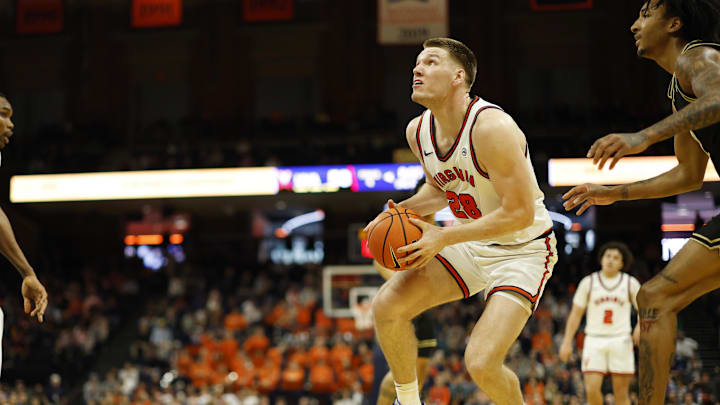 Mar 3, 2026; Charlottesville, Virginia, USA; Virginia Cavaliers forward Thijs de Ridder (28) drives to the basket past Wake Forest Demon Deacons forward Juke Harris (2) in the second half at John Paul Jones Arena. Mandatory Credit: Geoff Burke-Imagn Images