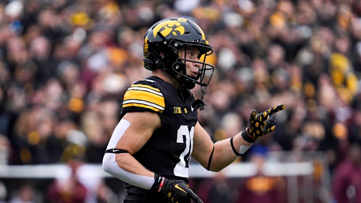 Iowa Hawkeyes wide receiver Kaden Wetjen (21) reacts after returning a punt for a touchdown against the Minnesota Golden Gophers Oct. 25, 2025 at Kinnick Stadium in Iowa City, Iowa. Iowa Hawkeyes wide receiver Kaden Wetjen (21) reacts after returning a punt for a touchdown against the Minnesota Golden Gophers Oct. 25, 2025 at Kinnick Stadium in Iowa City, Iowa.