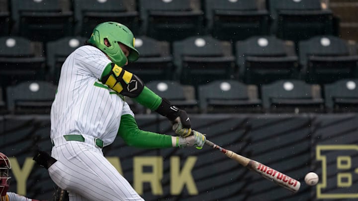 Oregon outfielder Mason Neville makes contact as the Oregon Ducks host the Minnesota Golden Gophers Saturday, March 15, 2025, at PK Park in Eugene, Ore.
