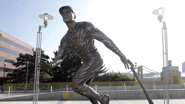 Sep 15, 2024; Pittsburgh, Pennsylvania, USA;   The statue of former Pittsburgh Pirates right fielder Roberto Clemente (21) outside of PNC Park. Major League Baseball celebrates Roberto Clemente Day on this day each year in memory of Clemente who died when the plane he was in carrying supplies to aid humanitarian efforts to those who suffered in a Nicaraguan earthquake crashed on New Years Eve 1973. Mandatory Credit: Charles LeClaire-Imagn Images