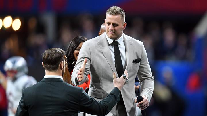 Feb 3, 2019; Atlanta, GA, USA; Houston Texans player JJ Watt congratulates Walter Payton NFL Man Of The Year winner Chris Long of the Philadelphia Eagles before Super Bowl LIII between the New England Patriots and the Los Angeles Rams at Mercedes-Benz Stadium. Mandatory Credit: Christopher Hanewinckel-Imagn Images