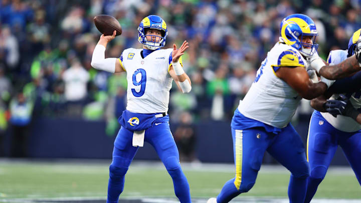 Jan 25, 2026; Seattle, WA, USA; Los Angeles Rams quarterback Matthew Stafford (9) passes against the Seattle Seahawks during the first half in the 2026 NFC Championship Game at Lumen Field. Mandatory Credit: Kevin Ng-Imagn Images