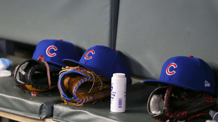 Apr 3, 2019; Atlanta, GA, USA; Detailed view of Chicago Cubs hats and gloves in the dugout against the Atlanta Braves in the fifth inning at SunTrust Park. Mandatory Credit: Brett Davis-Imagn Images
Apr 3, 2019; Atlanta, GA, USA; Detailed view of Chicago Cubs hats and gloves in the dugout against the Atlanta Braves in the fifth inning at SunTrust Park. Mandatory Credit: Brett Davis-Imagn Images