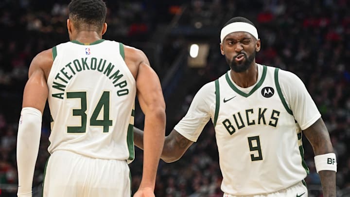 Nov 13, 2023; Milwaukee, Wisconsin, USA; Milwaukee Bucks forward Bobby Portis (9) reacts with forward Giannis Antetokounmpo (34) after scoring a basket in the fourth quarter against the Chicago Bulls at Fiserv Forum. Mandatory Credit: Benny Sieu-Imagn Images