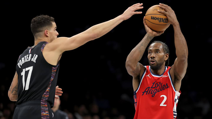 Jan 9, 2026; Brooklyn, New York, USA; Los Angeles Clippers forward Kawhi Leonard (2) looks to shoot the ball against Brooklyn Nets forward Michael Porter Jr. (17) during the second quarter at Barclays Center. Mandatory Credit: Brad Penner-Imagn Images Jan 9, 2026; Brooklyn, New York, USA; Los Angeles Clippers forward Kawhi Leonard (2) looks to shoot the ball against Brooklyn Nets forward Michael Porter Jr. (17) during the second quarter at Barclays Center. Mandatory Credit: Brad Penner-Imagn Images