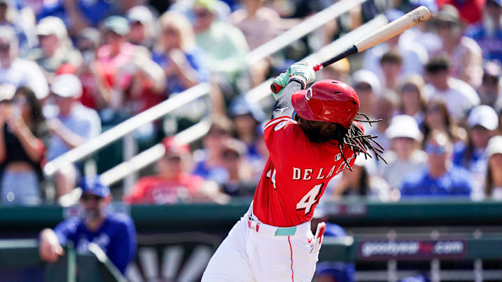 Cincinnati Reds shortstop Elly De La Cruz (44) hits the ball in the first inning of a Cactus League game between the Cincinnati Reds and Los Angeles Dodgers, Monday, Feb. 24, 2025, at Goodyear Ballpark in Goodyear, Ariz.